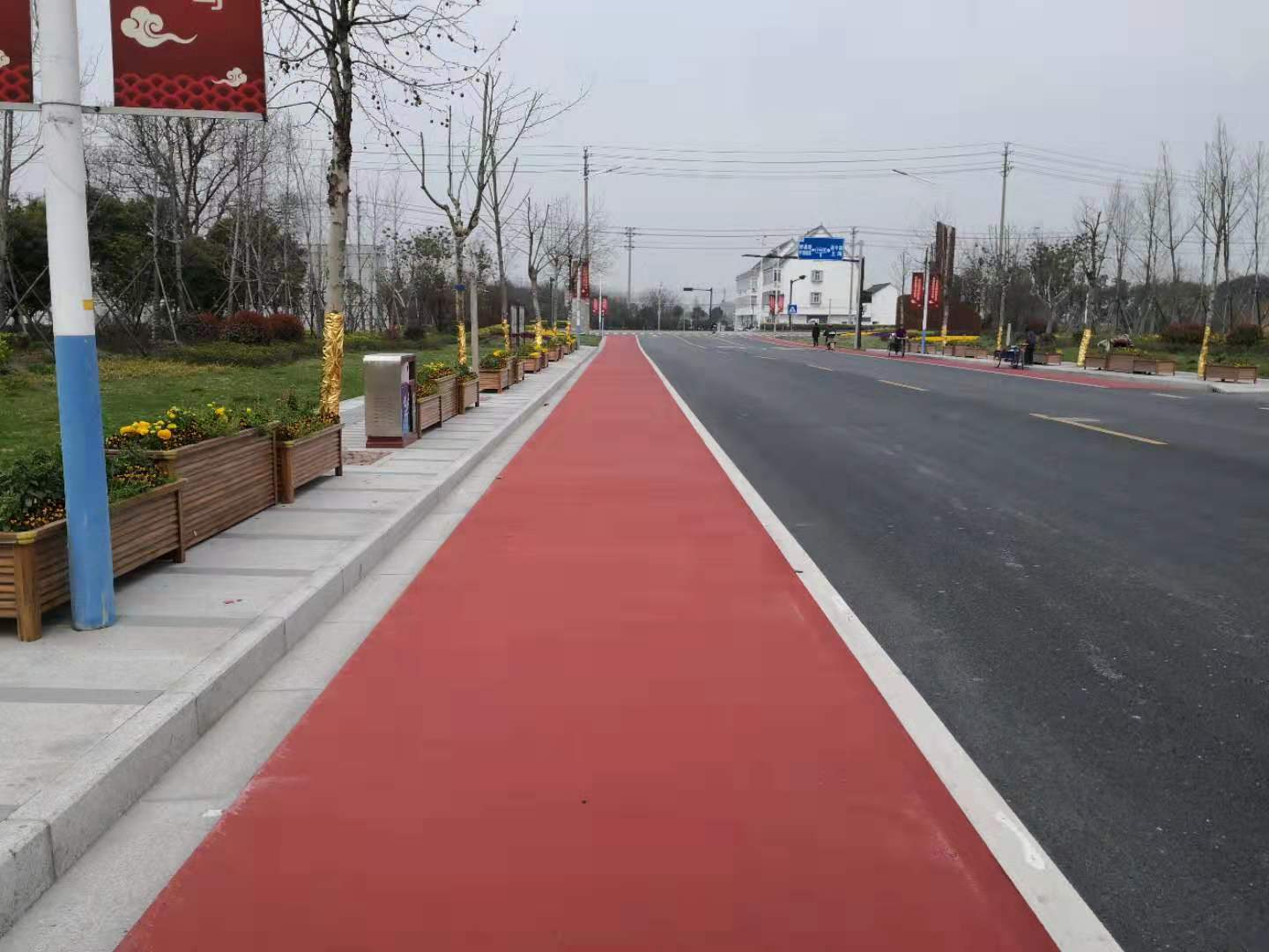 进口彩色防滑路面施工_彩色艺术路面相关-上海柯路美道路工程有限公司